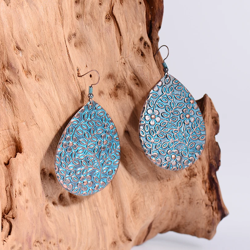 Ethnic Style Blue Copper Water Drops Big Earring For Women Bohemian Flower Carved Golden Alloy Drop Dangle Earrings Hot Sale
Ethnic Style Blue Copper Water Drops Big Earring For Women Bohemian Flower Carved Golden Alloy Drop Dangle Earrings Hot Sale