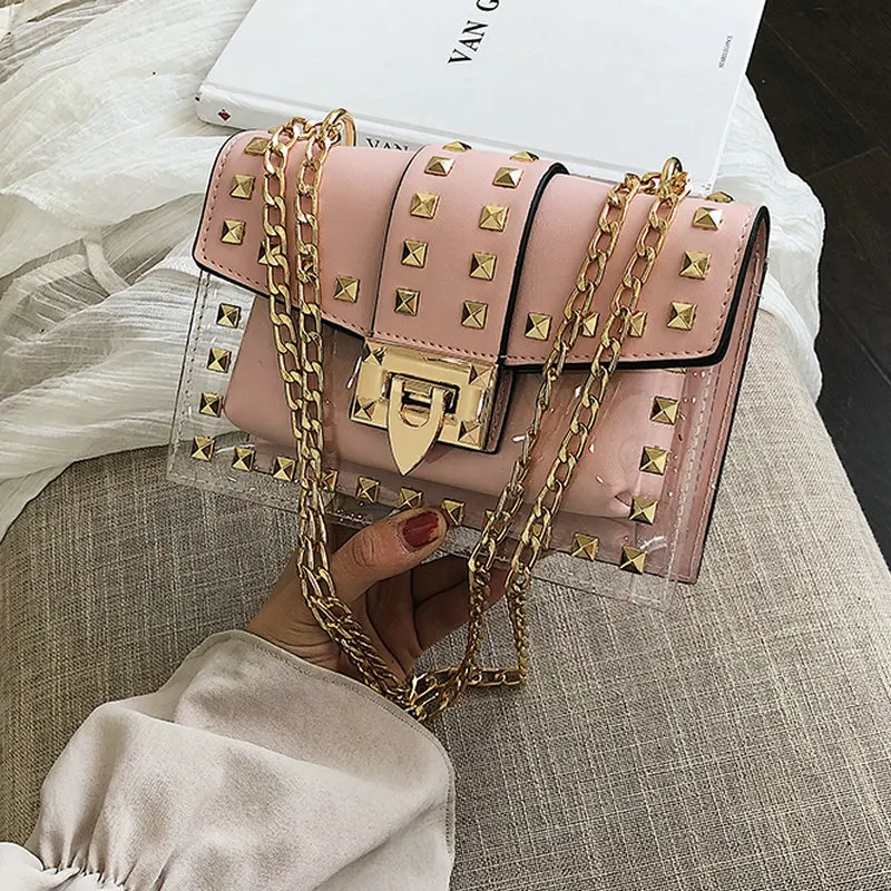 Designer Women Shoulder Bag Small Flap Clear PVC Leather Rivets Chains Messenger Bag Female Transparent Handbag Beach Bag 6188
Designer Women Shoulder Bag Small Flap Clear PVC Leather Rivets Chains Messenger Bag Female Transparent Handbag Beach Bag 6188