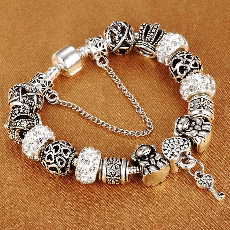 Lover Style Silver Plated Charm Bracelet With Key Crown Beads Fit DIY Brand Bracelet For Women Jewelry
Lover Style Silver Plated Charm Bracelet With Key Crown Beads Fit DIY Brand Bracelet For Women Jewelry
