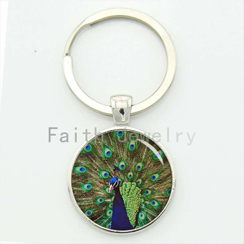 Charming peacock photo key chain pretty peacock spreads its tail feathers Indian style keychain beautiful bird gift KC484
Charming peacock photo key chain pretty peacock spreads its tail feathers Indian style keychain beautiful bird gift KC484