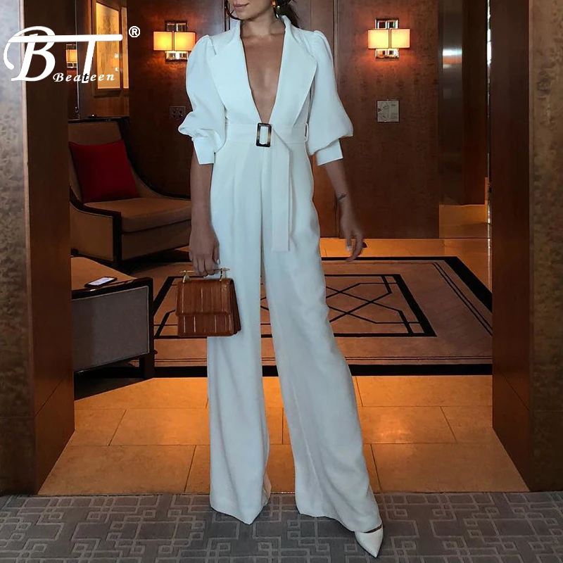 Beateen 2019 New White Sexy Deep V Neck Mid-Sleeve Lapel Puff Sleeve Office Lady Party Jumpsuit With Belt
Beateen 2019 New White Sexy Deep V Neck Mid-Sleeve Lapel Puff Sleeve Office Lady Party Jumpsuit With Belt