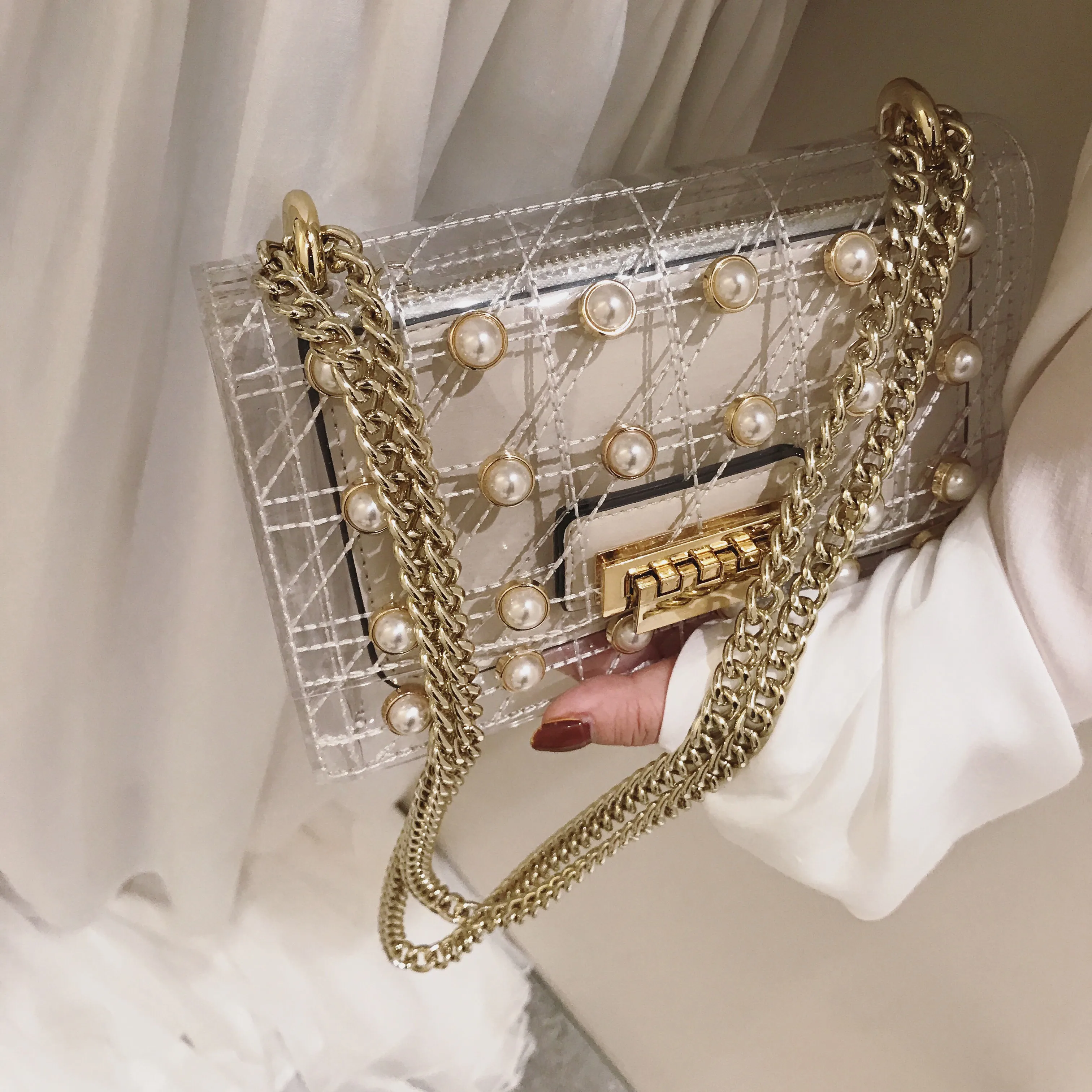Pearl jelly package 2019 new fashion chain shoulder slung packet transparent bag tide 
Pearl jelly package 2019 new fashion chain shoulder slung packet transparent bag tide