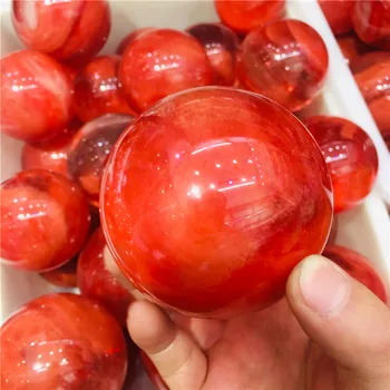 10 mm natural red smelting crystal ball natural feng shui healing gem + bracket.
10 mm natural red smelting crystal ball natural feng shui healing gem + bracket.