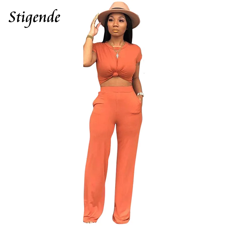 Stigende Women Casual Solid Color 2 Piece Pants Set Summer Short Sleeve Crop Top Two Piece Set Wide Leg Bodycon 2pcs Outfit Set
Stigende Women Casual Solid Color 2 Piece Pants Set Summer Short Sleeve Crop Top Two Piece Set Wide Leg Bodycon 2pcs Outfit Set