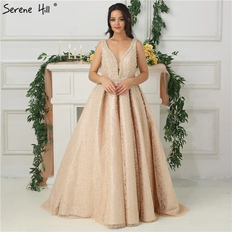 2019 Nude Deep-V Sleeveless Sexy Evening Dresses Long 2019 Pearls Crystal Luxury Evening Ball Gowns Real Photo LA6173
2019 Nude Deep-V Sleeveless Sexy Evening Dresses Long 2019 Pearls Crystal Luxury Evening Ball Gowns Real Photo LA6173
