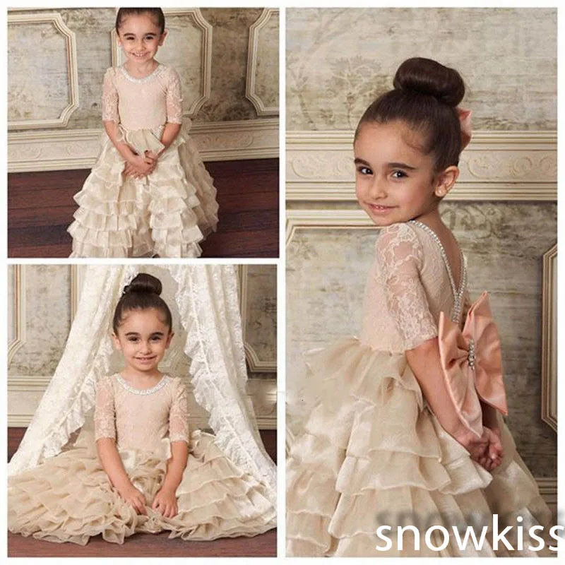 Champagne cupcake flower girl dresses half sleeves with Bow Crystals nude kids Birthday Party Formal Gown first communion dress
Champagne cupcake flower girl dresses half sleeves with Bow Crystals nude kids Birthday Party Formal Gown first communion dress