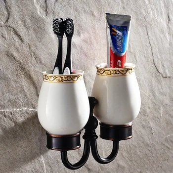 Antique Black Carved Toothbrush Holder With Ceramic Cups Brushed Bronze Copper Cup Holder Mounting Bathroom Accessories j33
Antique Black Carved Toothbrush Holder With Ceramic Cups Brushed Bronze Copper Cup Holder Mounting Bathroom Accessories j33