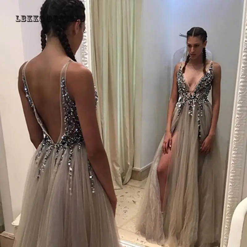 2019 V Neck Slit Prom Dresses long Crystal Tulle Prom Party Dresses Vestido Formatura Longo Junior High Graduation Dresses
2019 V Neck Slit Prom Dresses long Crystal Tulle Prom Party Dresses Vestido Formatura Longo Junior High Graduation Dresses