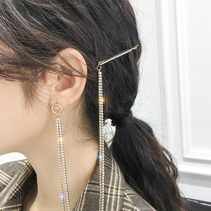 Korean women fashion long tassel asymmetry earrings charm sparkling rhinestone fringe earring hair clip 2019 accessories R31
Korean women fashion long tassel asymmetry earrings charm sparkling rhinestone fringe earring hair clip 2019 accessories R31