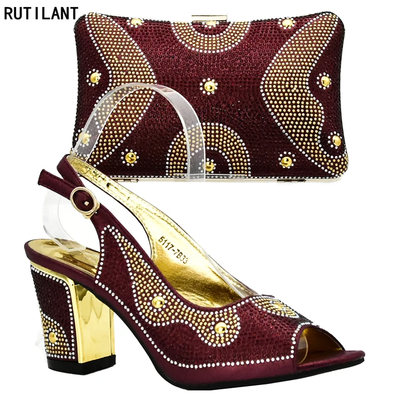 Latest Wine Color Ladies Italian Shoes and Bag Set Decorated with Rhinestone African Wedding Shoes and Bag Set Party Shoes Bag
Latest Wine Color Ladies Italian Shoes and Bag Set Decorated with Rhinestone African Wedding Shoes and Bag Set Party Shoes Bag