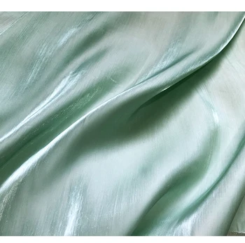 New Super Gloss Silk Satin Mint Green Crystal Silk Pearlescent Silk Slip Fashion Satin Fabric
New Super Gloss Silk Satin Mint Green Crystal Silk Pearlescent Silk Slip Fashion Satin Fabric
