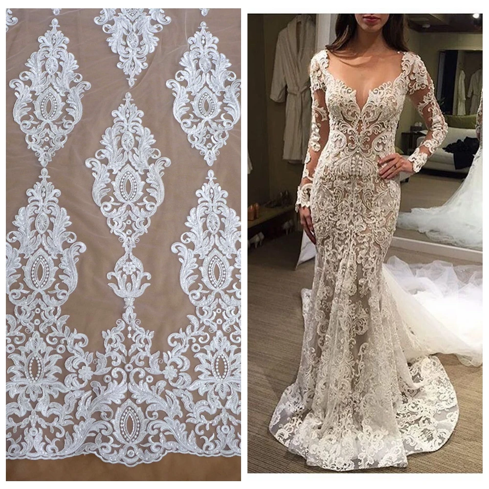 La Belleza Stock New off white/White/large pattener handmade beaded (or without beads) wedding dress lace fabric
La Belleza Stock New off white/White/large pattener handmade beaded (or without beads) wedding dress lace fabric