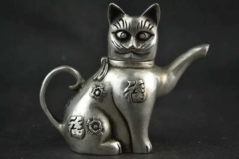 Chinese Collectible Decorate Handwork Old Tibet silver carving cat Lucky tea pot
Chinese Collectible Decorate Handwork Old Tibet silver carving cat Lucky tea pot