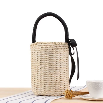 Fashion portable bucket woven bag handcuffs solid color black ribbon straw bag summer vacation photo beach bag
Fashion portable bucket woven bag handcuffs solid color black ribbon straw bag summer vacation photo beach bag