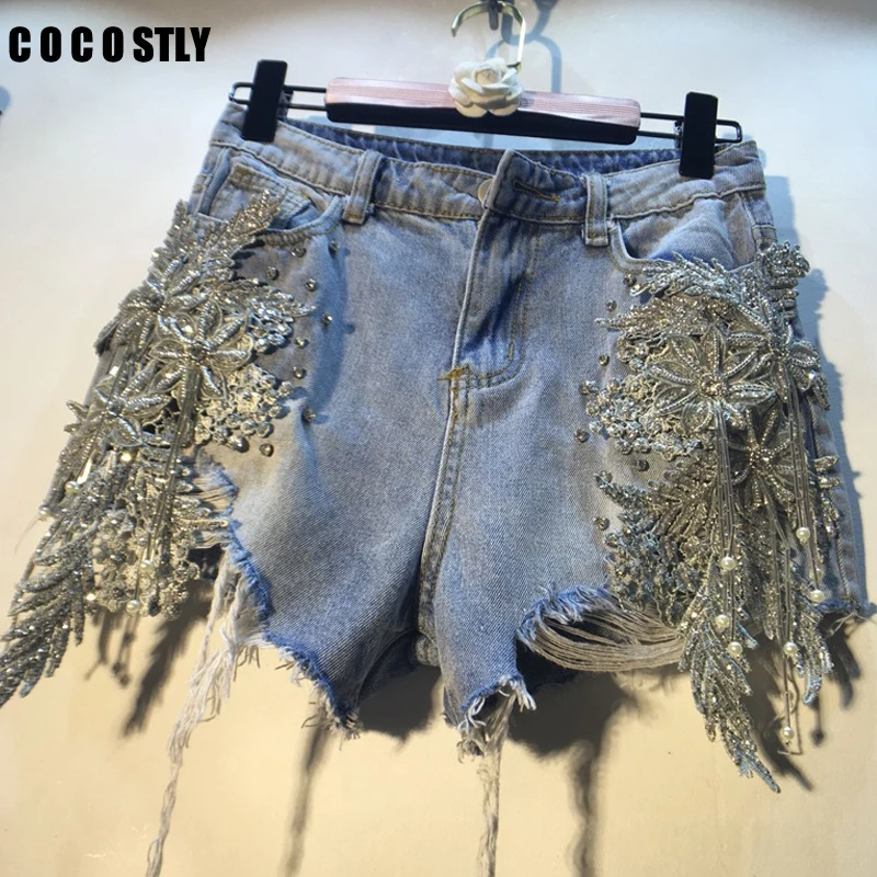 2019 Summer Denim Shorts Women Split Joint Pearl Paillette Three-dimensional Flower High Waist Holes Denim Fashion Shorts Woman
2019 Summer Denim Shorts Women Split Joint Pearl Paillette Three-dimensional Flower High Waist Holes Denim Fashion Shorts Woman