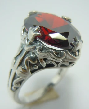 The new 2014 ancient pattern garnet 9.1 CT noble personality romantic index finger ring
The new 2014 ancient pattern garnet 9.1 CT noble personality romantic index finger ring