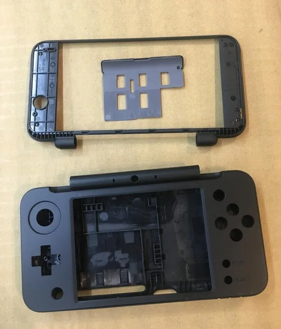 Replacement Housing Shell Cover Case for New 2DS XL for NEW 2DSLL Console Shell Middle Frame Battery Cover
Replacement Housing Shell Cover Case for New 2DS XL for NEW 2DSLL Console Shell Middle Frame Battery Cover