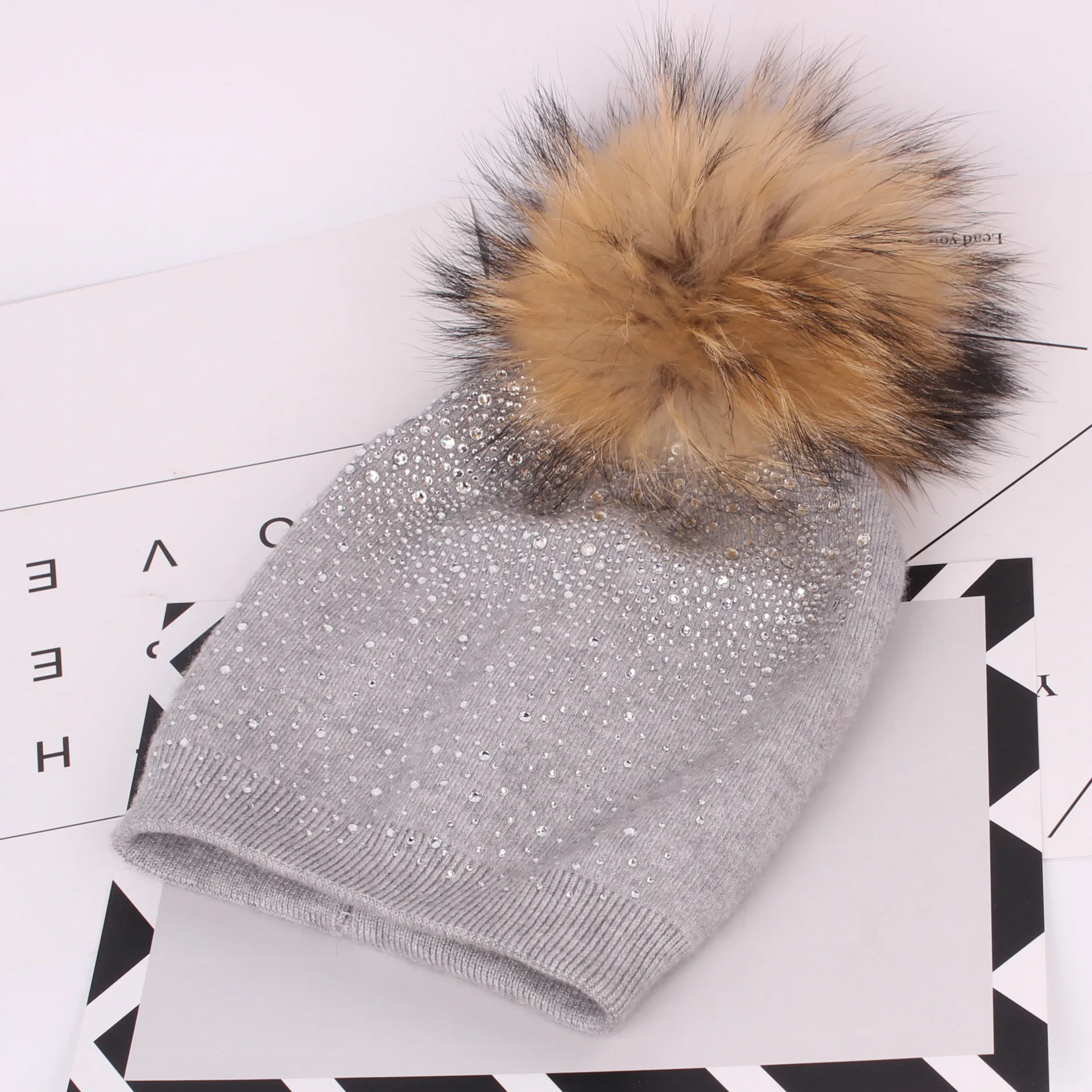 Female knitting wool hat big raccoon hair drills very true hair in the fall and winter hats for women pompom
Female knitting wool hat big raccoon hair drills very true hair in the fall and winter hats for women pompom