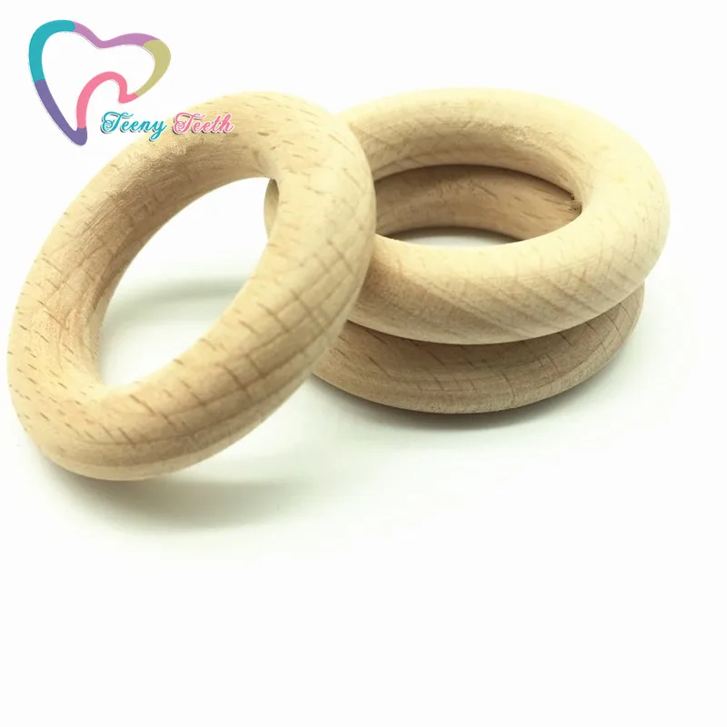 Teeny Teeth Beech Wooden 50 PCS Round Wood Ring 40 MM Baby Teether Ring DIY Crafts Gift Teething Accessory Nursing Wood Rings 
Teeny Teeth Beech Wooden 50 PCS Round Wood Ring 40 MM Baby Teether Ring DIY Crafts Gift Teething Accessory Nursing Wood Rings