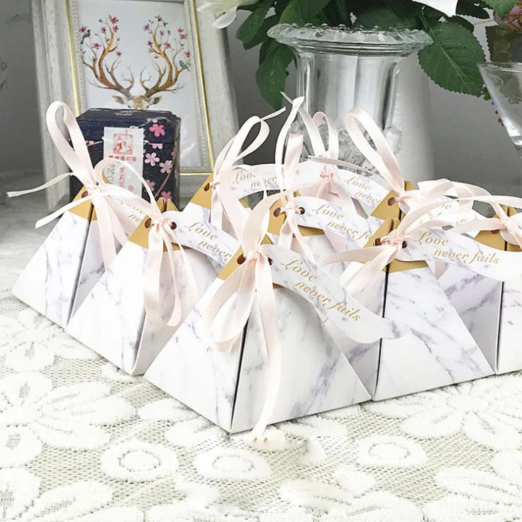 New Europe Triangular Pyramid Style Candy Box Wedding Favors Party Supplies Paper Gift Boxes with THANKS Card & Ribbon 100pcs
New Europe Triangular Pyramid Style Candy Box Wedding Favors Party Supplies Paper Gift Boxes with THANKS Card & Ribbon 100pcs