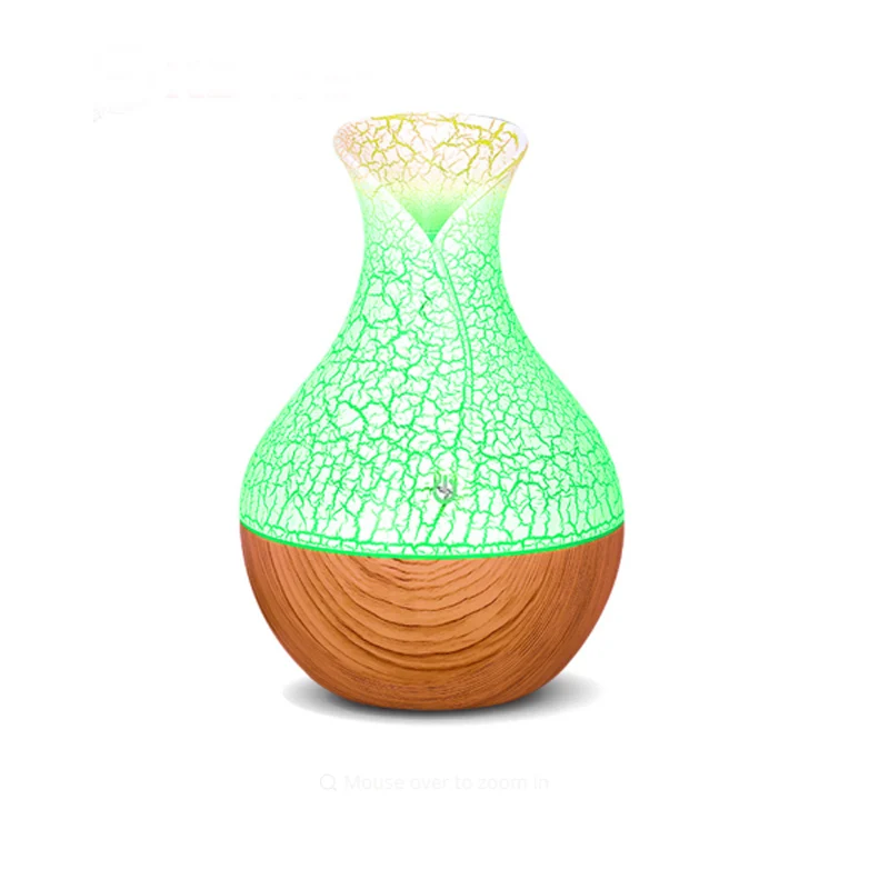 130ml mini USB air humidifier aroma oil diffuser essential aroma mist maker fogger creative crackle with 7 LED colors
130ml mini USB air humidifier aroma oil diffuser essential aroma mist maker fogger creative crackle with 7 LED colors