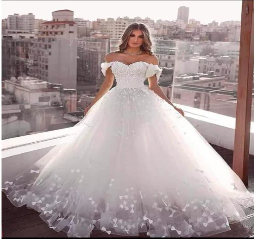 ball gown wedding dresses bowknot flowers bridal dresses arabic wedding gowns puffy off the shoulder bridal dress
ball gown wedding dresses bowknot flowers bridal dresses arabic wedding gowns puffy off the shoulder bridal dress