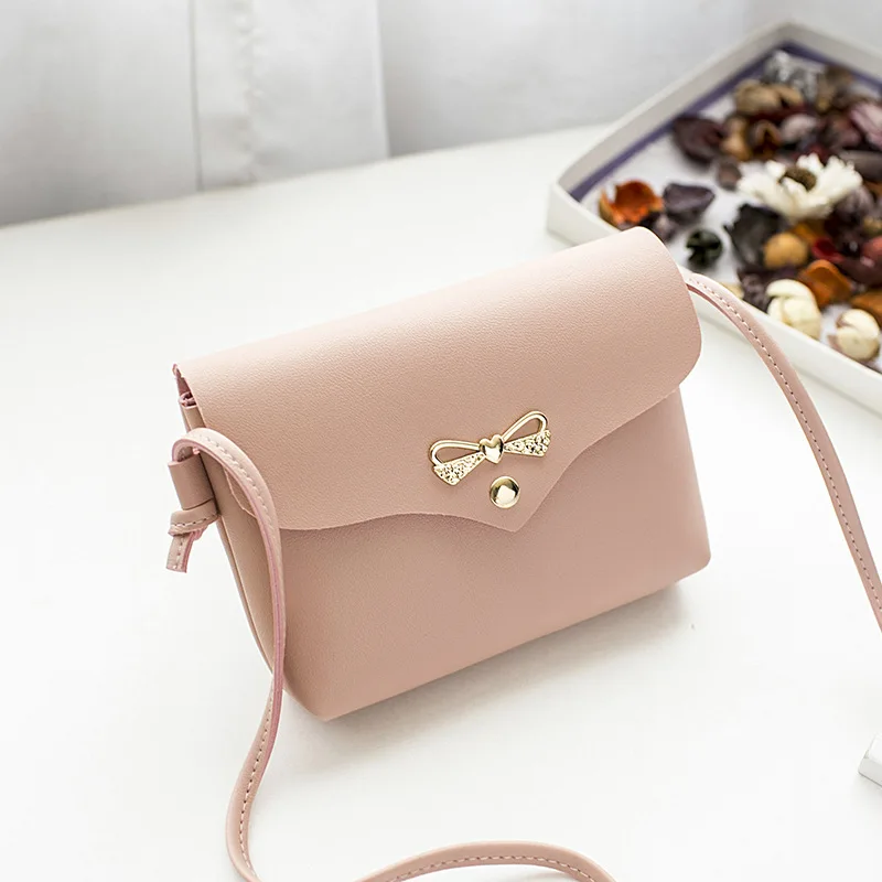 2019 Women's Shoulder Bag Simple Style Stylish Metal Bowknot Decorative Button HandBag Female PU Mini Messenger Crossbody Bag
2019 Women's Shoulder Bag Simple Style Stylish Metal Bowknot Decorative Button HandBag Female PU Mini Messenger Crossbody Bag