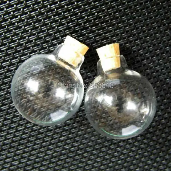 300pcs/lot clear glass ball 24x28mm transparent glass bottle with cork glass vial pendant glass globes glass dome diy finding
300pcs/lot clear glass ball 24x28mm transparent glass bottle with cork glass vial pendant glass globes glass dome diy finding