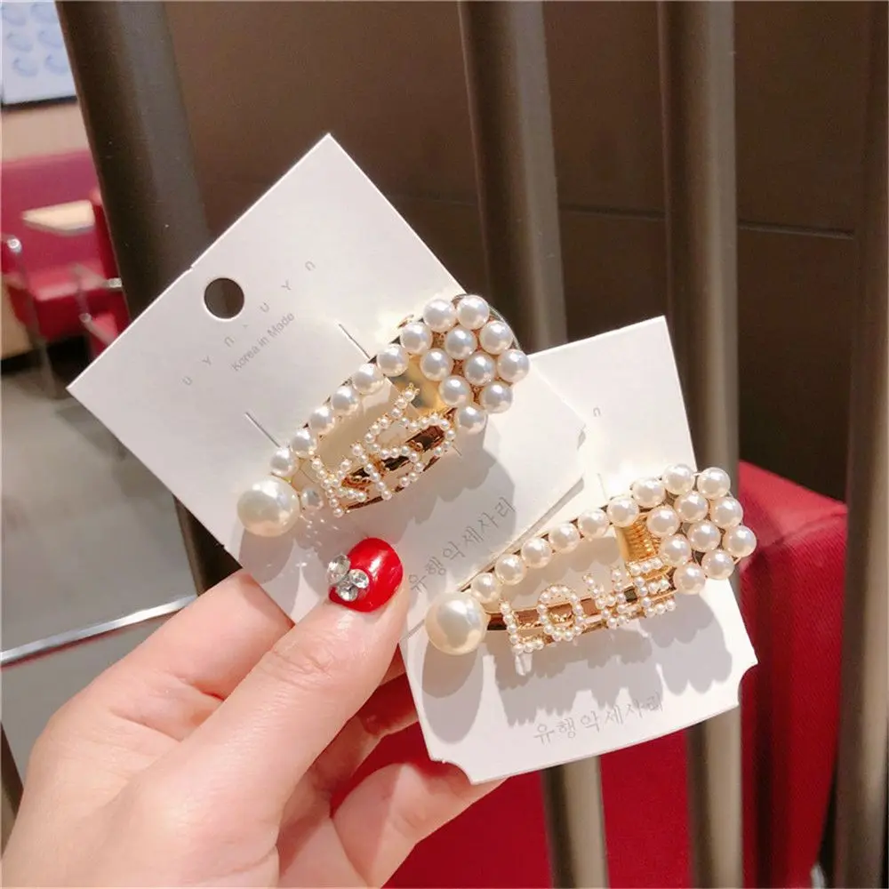 Fashion Metal Pearl Hairpin Hollow Waterdrop Letter KISS LOVE Hair Clip for Women Hair Accessories
Fashion Metal Pearl Hairpin Hollow Waterdrop Letter KISS LOVE Hair Clip for Women Hair Accessories