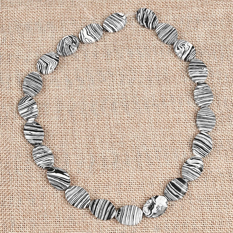 14*18*5MM Bigger and fuller and Oval round Black add White natural Synthesis Zebra stone Loose beads
14*18*5MM Bigger and fuller and Oval round Black add White natural Synthesis Zebra stone Loose beads
