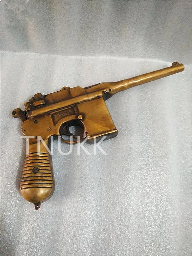TNUKK Do the old antique bronze metal copper brass ornaments hand weapon pistol guns crafts.
TNUKK Do the old antique bronze metal copper brass ornaments hand weapon pistol guns crafts.