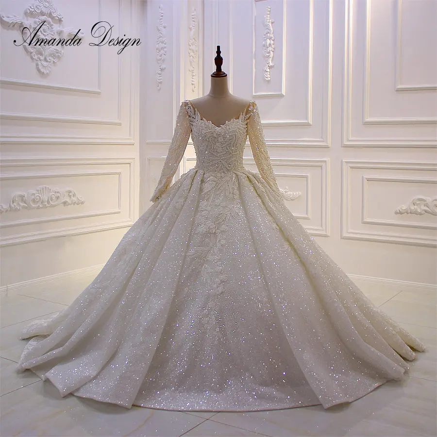 Amanda Design Customized Long Sleeve Lace Applique Ball Gown Luxury Sparkle Wedding Dress
Amanda Design Customized Long Sleeve Lace Applique Ball Gown Luxury Sparkle Wedding Dress