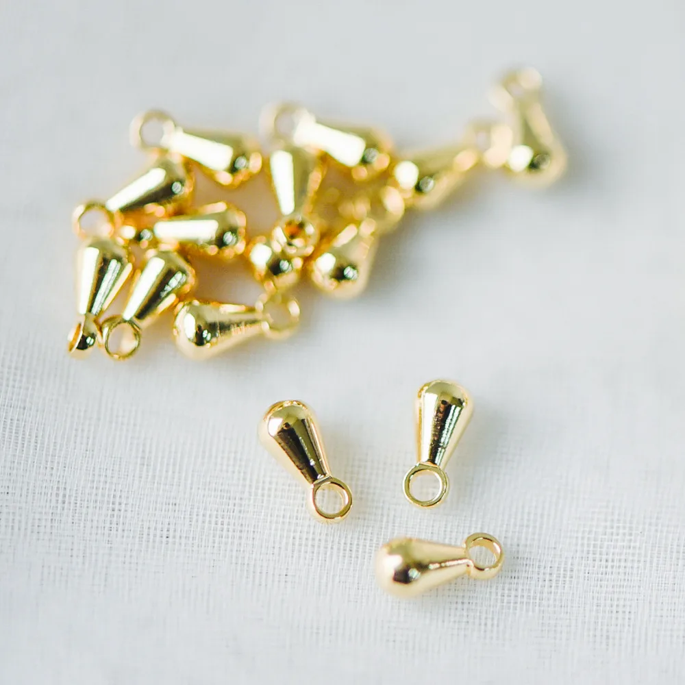 50pcs/Lot Mini Gold/ Silver Teardrop Charms 6x3mm, Real Gold/ Rhodium Plated Brass Bracelet End Drop, Water Drop Extender
50pcs/Lot Mini Gold/ Silver Teardrop Charms 6x3mm, Real Gold/ Rhodium Plated Brass Bracelet End Drop, Water Drop Extender