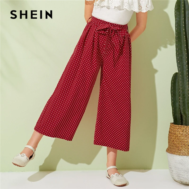 SHEIN Kiddie Burgundy Polka Dot Wide Leg Girls Pants With Belt 2019 Summer Vacation Elastic Waist Pleated Boho Loose Trousers
SHEIN Kiddie Burgundy Polka Dot Wide Leg Girls Pants With Belt 2019 Summer Vacation Elastic Waist Pleated Boho Loose Trousers