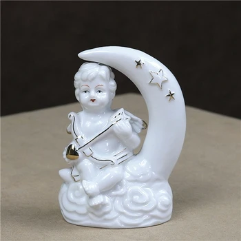 European Porcelain Moon Cupid Miniature Ceramic Doll Amor Angel Figurine Home Decor Art and Craft Present Ornament Accessories
European Porcelain Moon Cupid Miniature Ceramic Doll Amor Angel Figurine Home Decor Art and Craft Present Ornament Accessories