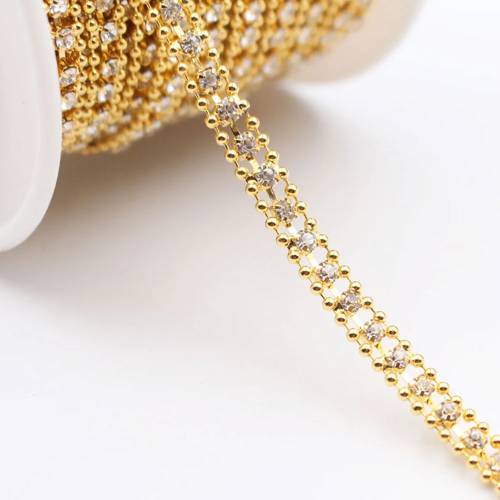 New 1 yards/lot Gold Base Rhinestones Chain 3 Rows Crystals And Stones Glass Cup Chain Glue-on Sewing Rhinestones For Clothes
New 1 yards/lot Gold Base Rhinestones Chain 3 Rows Crystals And Stones Glass Cup Chain Glue-on Sewing Rhinestones For Clothes