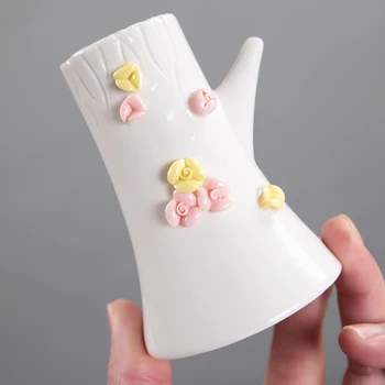 Flower hand ceramic vase ceramic dried flowers simple hydroponics creative home decoration
Flower hand ceramic vase ceramic dried flowers simple hydroponics creative home decoration