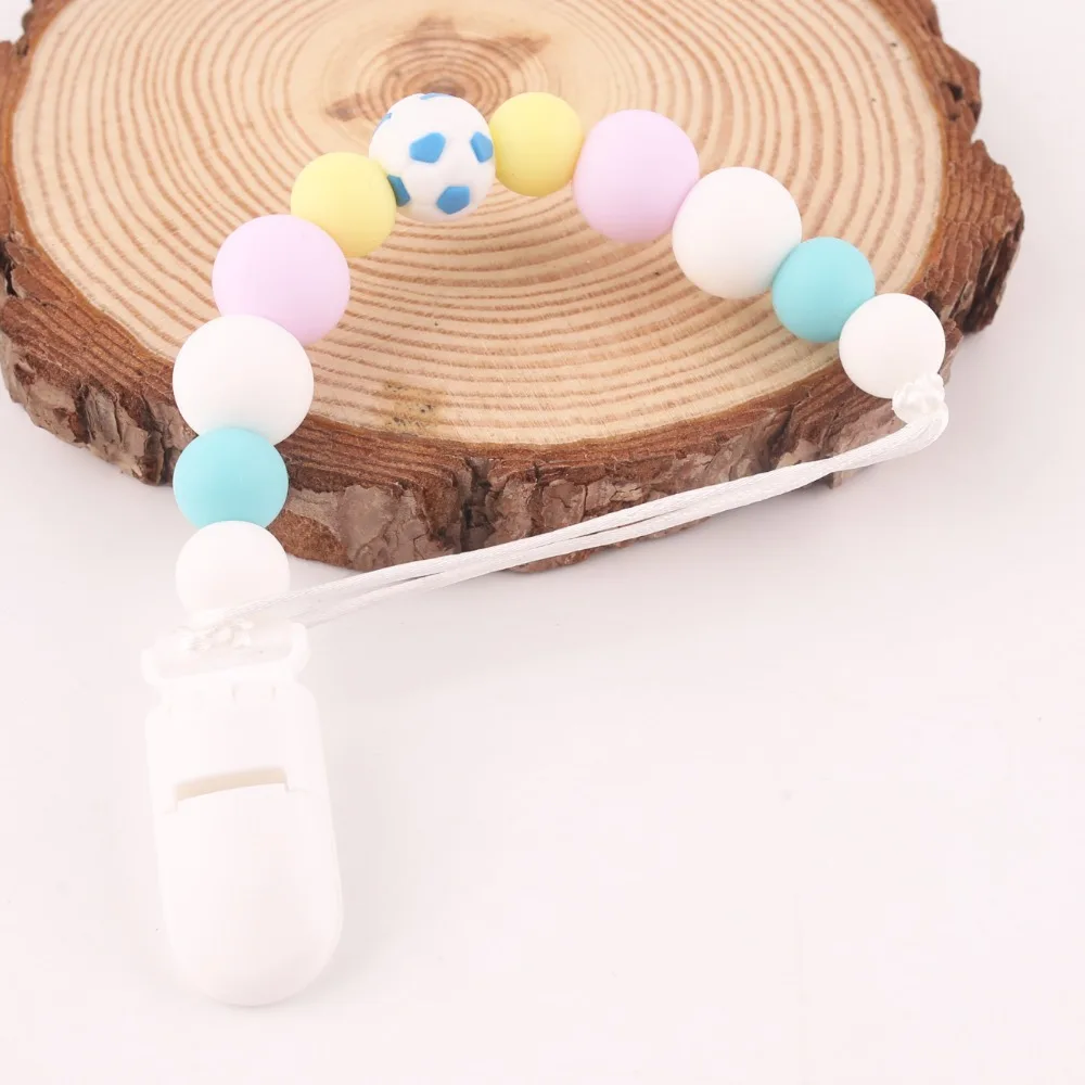 CHEWELRY Baby Teether 1pc Soccer Silicone Beads Rodent Football Teething Nurse Gifts Pacifier Chains Baby Product Dummy Clips
CHEWELRY Baby Teether 1pc Soccer Silicone Beads Rodent Football Teething Nurse Gifts Pacifier Chains Baby Product Dummy Clips