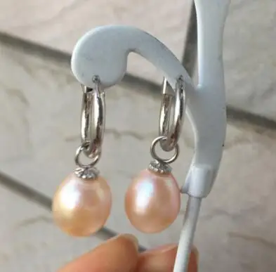 Wholesale price ^^^elegant pair of huge 11-12mm south sea gold pink pearl earring
Wholesale price ^^^elegant pair of huge 11-12mm south sea gold pink pearl earring