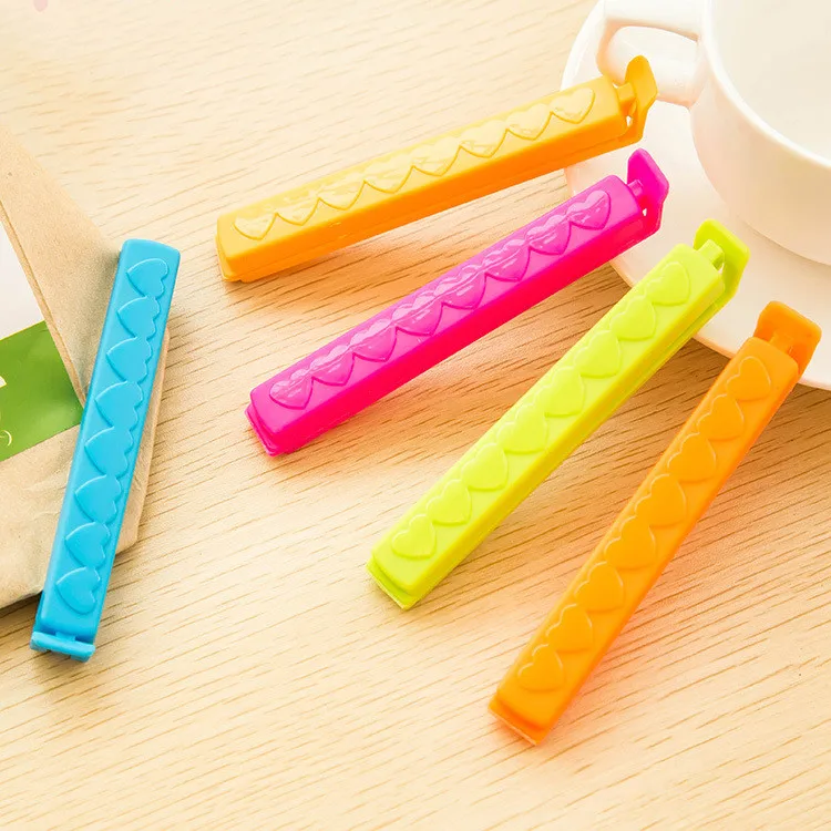 5Pcs Kitchen Storage Food Snack Seal Sealing Bag Clips Sealer Clamp Plastic Tool Househould Food Bag Close Clip Kitchen Tools
5Pcs Kitchen Storage Food Snack Seal Sealing Bag Clips Sealer Clamp Plastic Tool Househould Food Bag Close Clip Kitchen Tools