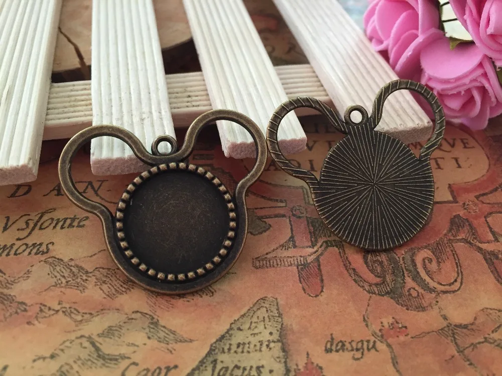 20pcs/lot.Antiqued Bronze mickey Pattern Tray Cameo Setting Pendant (inner Size 18mm)
20pcs/lot.Antiqued Bronze mickey Pattern Tray Cameo Setting Pendant (inner Size 18mm)