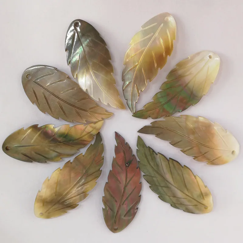 Wholesale natural shell Plant leaves fashion Colorful shell Necklace pendant for jewelry making accessories 12Pcs/lot
Wholesale natural shell Plant leaves fashion Colorful shell Necklace pendant for jewelry making accessories 12Pcs/lot