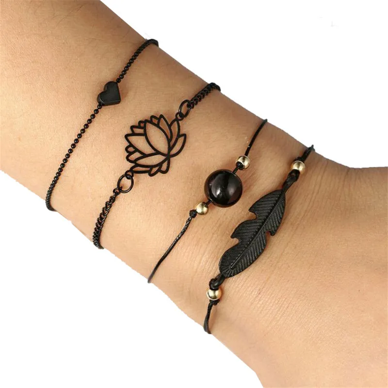 pack of 4 inspired bangle bracelet with faux pearl and heart /embossed leaf /hollow lotus design in mixed link chains in black
pack of 4 inspired bangle bracelet with faux pearl and heart /embossed leaf /hollow lotus design in mixed link chains in black
