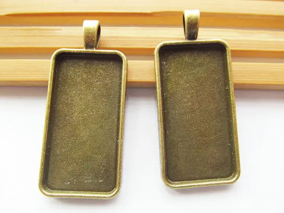 50pcs Antique Bronze Rectangle Frame Cameo Setting Tray Bezel Pendant Charm/Finding,fit 19mmx38mm Cabochon/Cameo,Big Bail
50pcs Antique Bronze Rectangle Frame Cameo Setting Tray Bezel Pendant Charm/Finding,fit 19mmx38mm Cabochon/Cameo,Big Bail