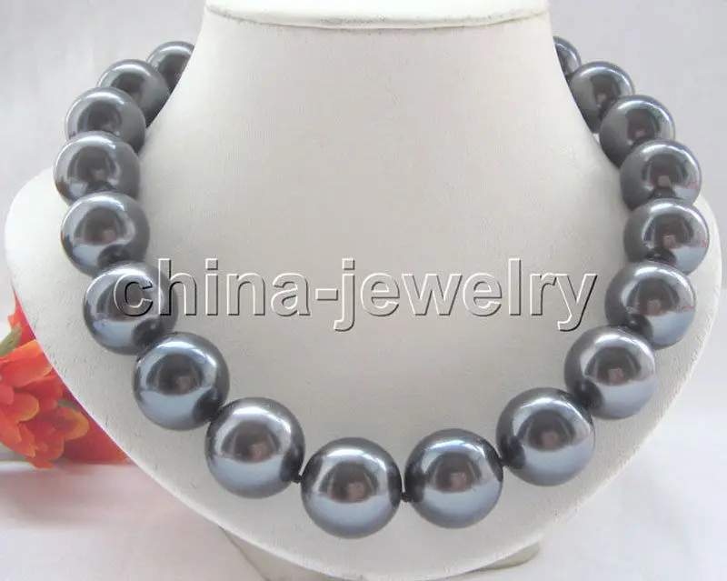 FREE SHIPPING HOT sell new Style >>>>Beautiful 18" 20mm peacock black perfect south sea shell pearl necklace 
FREE SHIPPING HOT sell new Style >>>>Beautiful 18" 20mm peacock black perfect south sea shell pearl necklace