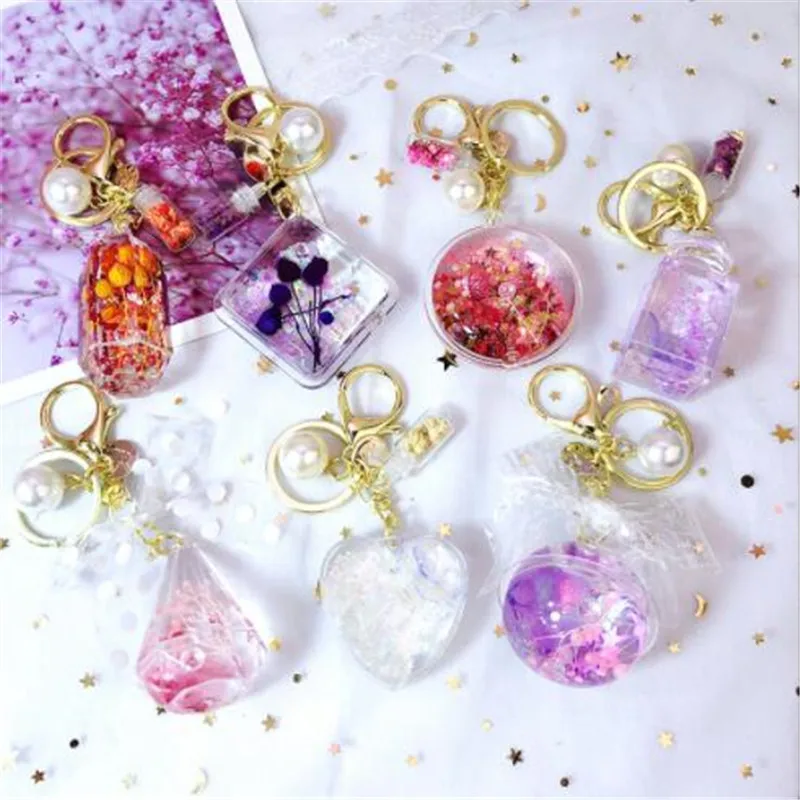 WKOUD Cute girl Round heart car keychain creative dry flower starry liquid crystal quicksand key ring bag pendant
WKOUD Cute girl Round heart car keychain creative dry flower starry liquid crystal quicksand key ring bag pendant