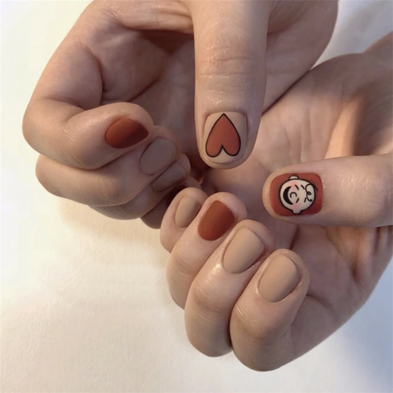 Matte orange hit pure color with cartoon pattern fake nails Japanese cute short size false nails 24pcs lady full nail tips
Matte orange hit pure color with cartoon pattern fake nails Japanese cute short size false nails 24pcs lady full nail tips
