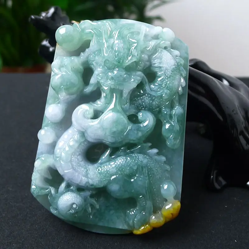 Myanmar natural A goods jade ice type high-grade elegant atmosphere features double color domineering dragon pendant 81.84g
Myanmar natural A goods jade ice type high-grade elegant atmosphere features double color domineering dragon pendant 81.84g