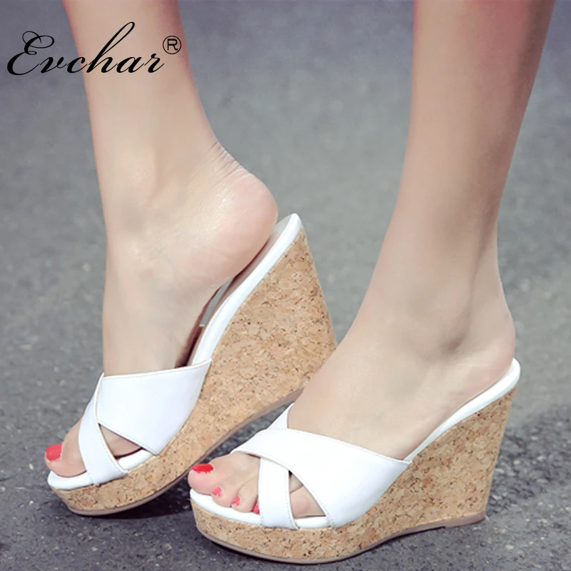 EVCHAR new Peep Toe Ladies Summer Wedge Shoes Genuine Leather super High Heel Wedge Fashion Slides Platform Women Slippers 34-39
EVCHAR new Peep Toe Ladies Summer Wedge Shoes Genuine Leather super High Heel Wedge Fashion Slides Platform Women Slippers 34-39