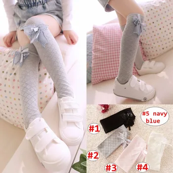 38CM Girl knee high socks Children Solid Color Grid leggings Baby Spring Autumn legwarmer with bow 5colors
38CM Girl knee high socks Children Solid Color Grid leggings Baby Spring Autumn legwarmer with bow 5colors